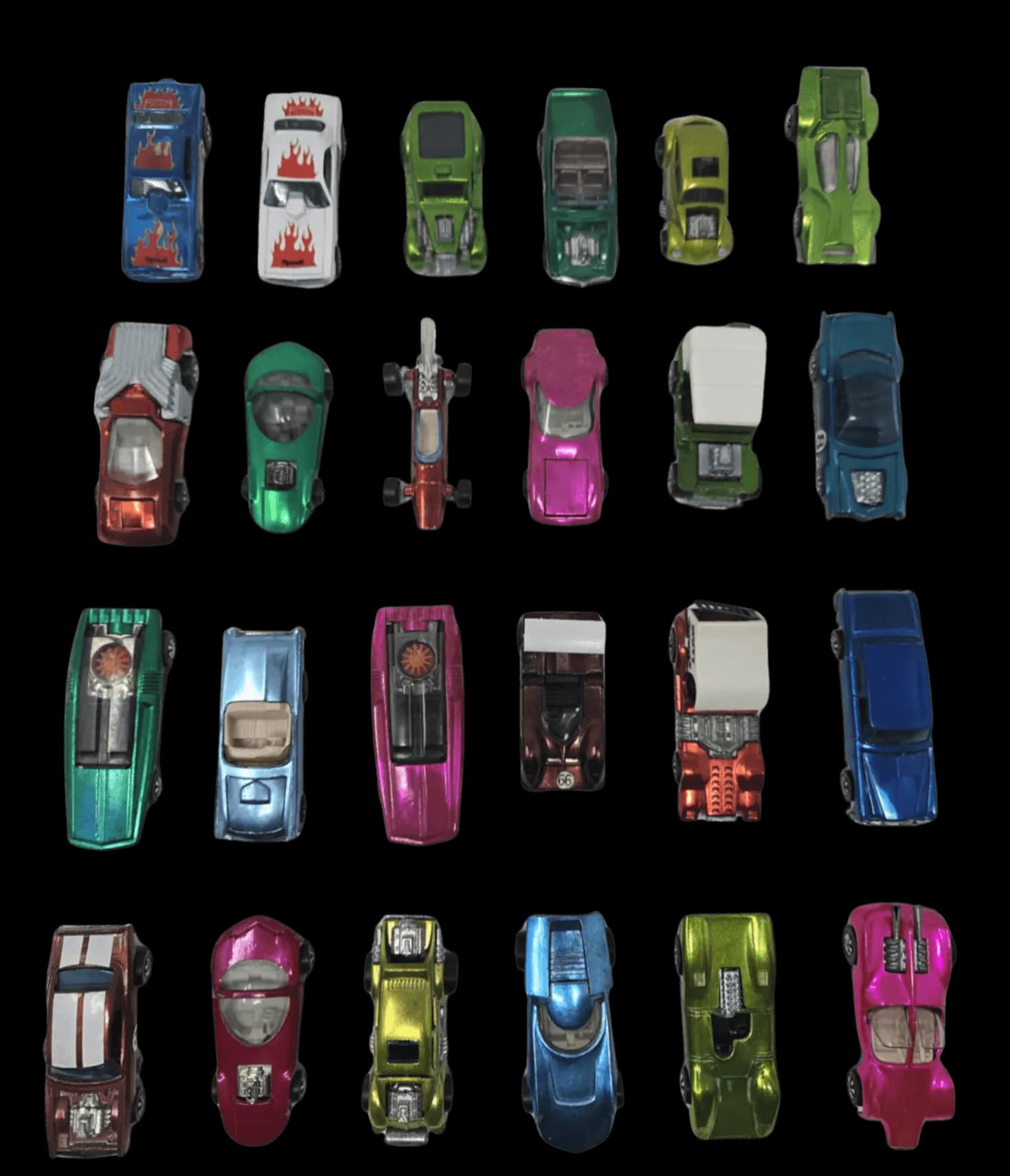 Group photo of Hot Wheels collection arranged on desk
