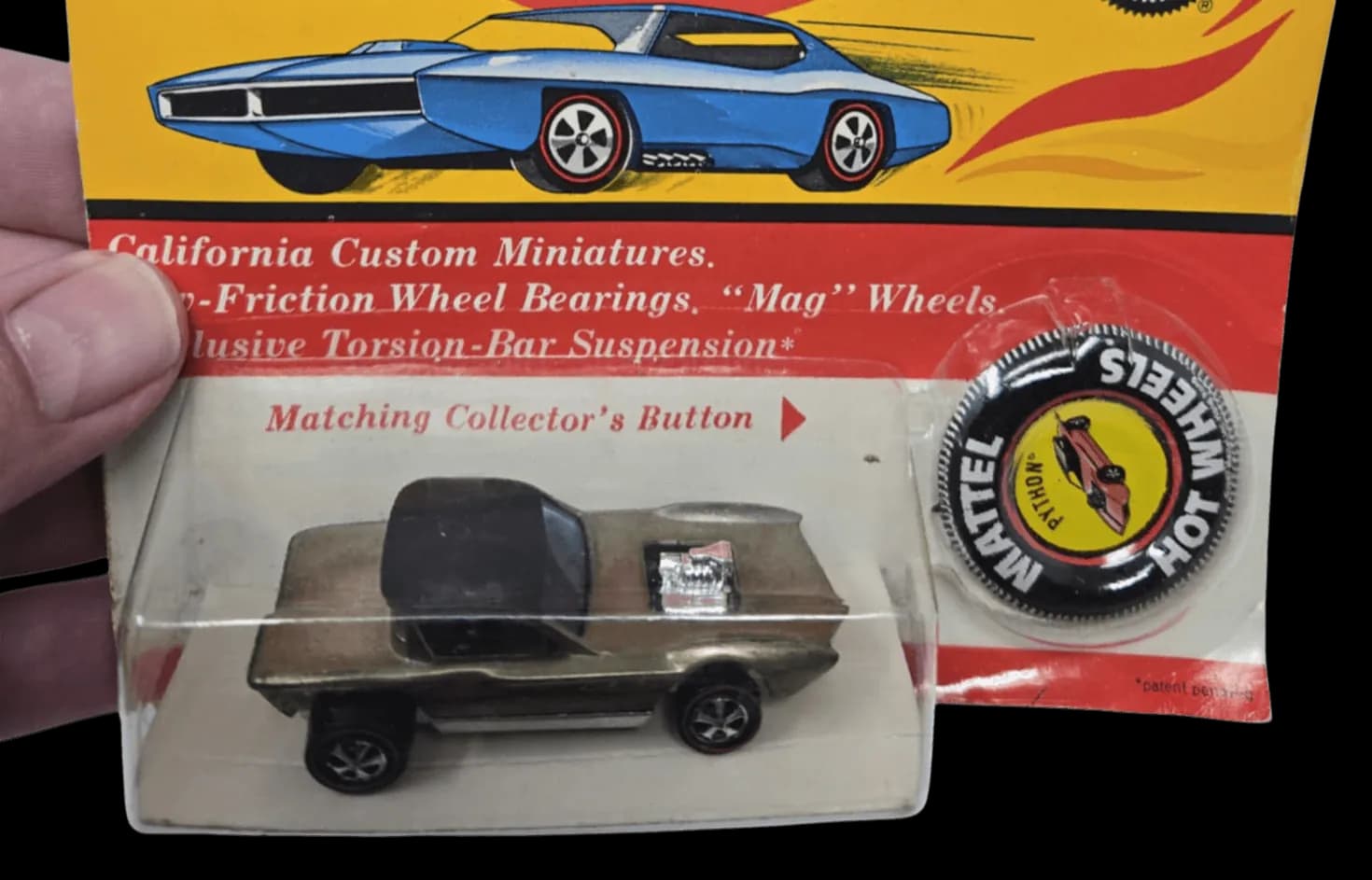 Individual close-up photo of Hot Wheels car showing condition details